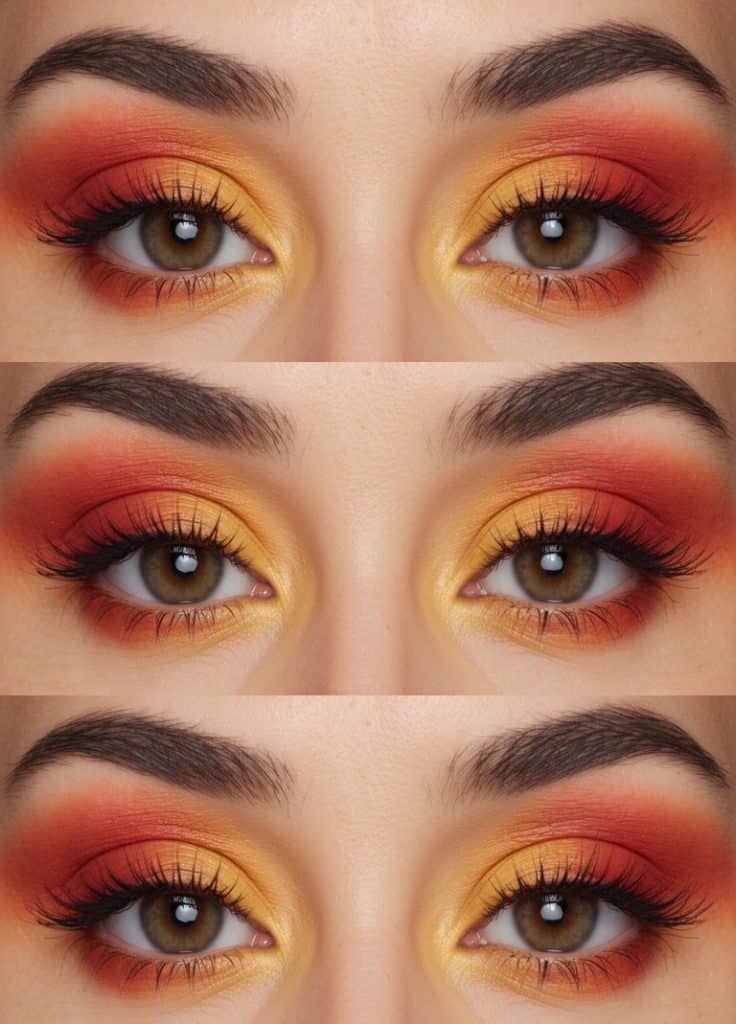 A pair of eyelids with a sunset ombre eye makeup look, blending shades of orange and red with a dip of golden yellow at the center