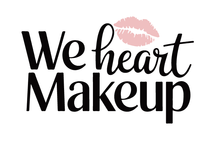 A textual design with the words 'We heart Makeup' written in a cursive font. Positioned above the text is a soft pink lipstick kiss mark. The design is predominantly in black and pink colors, with the text centered and the lipstick mark placed towards the top right corner.