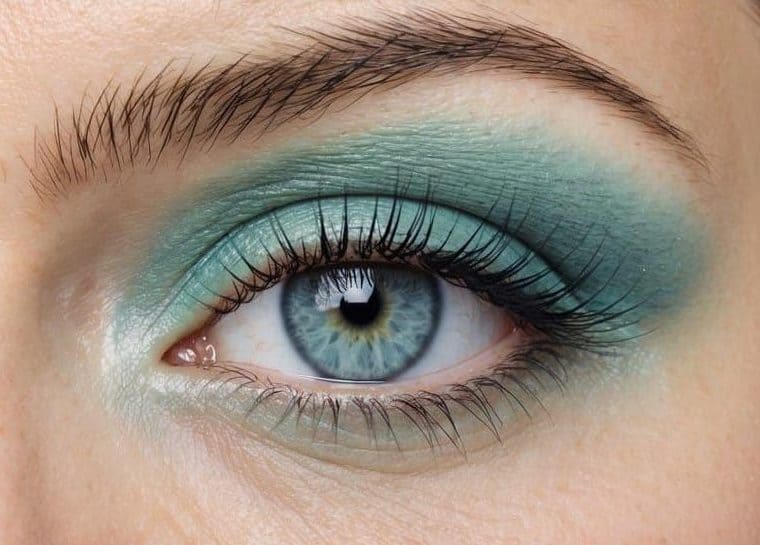 Eyeshadow in the color of a tranquil ocean wave with hints of pastel green