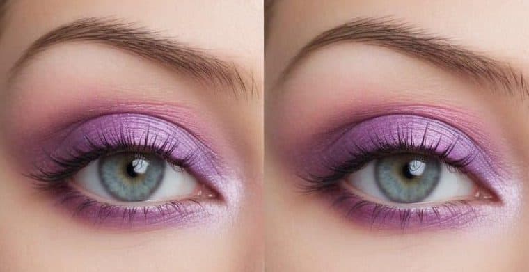 A close-up of a pair of eyes with pastel periwinkle, pink, and purple eye makeup, creating a romantic and colorful look