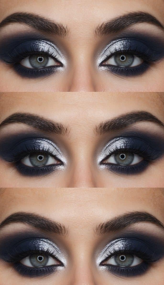 A close-up of a navy and silver smokey eye makeup look, with a romantic and dramatic feel