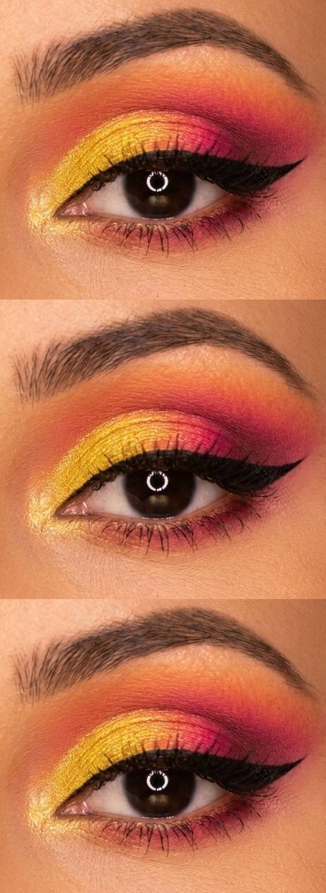 Close-up of an eye with a bold sunset-inspired eyeshadow look, featuring a gradient from yellow to pink and orange, complemented by thick black eyeliner.
