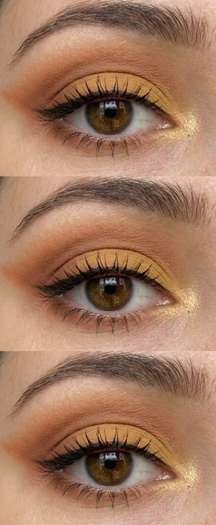 Haldi eye makeup look featuring matte turmeric yellow on the lid, warm brown crease, and light gold shimmer near the tear duct.