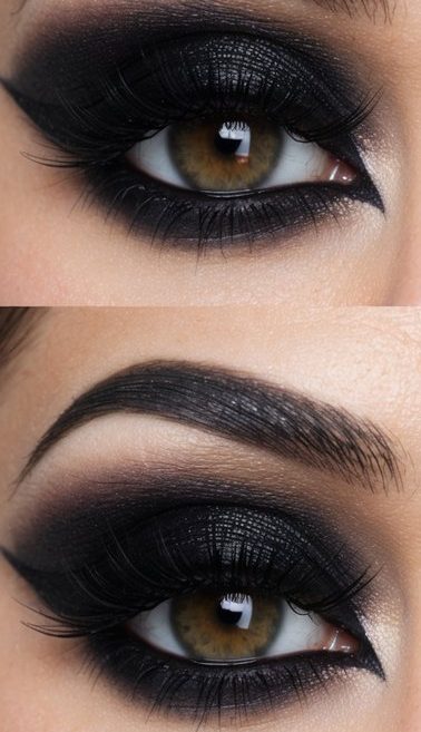 A close-up of a dramatic, gothic-inspired eye makeup look with jet black eyeshadow, bold eyeliner, and intricate details
