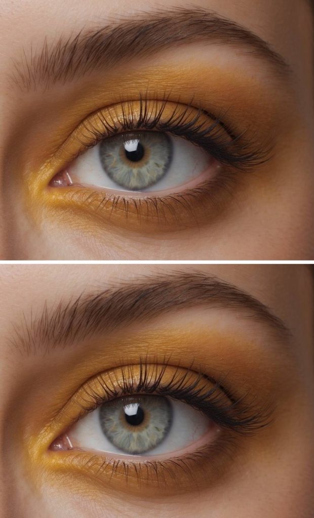 Muted golden eyeshadow drifting outward into a soft lower-eye taupe rim, creating atmospheric yellow eye makeup ideas with a subtle smoky character.