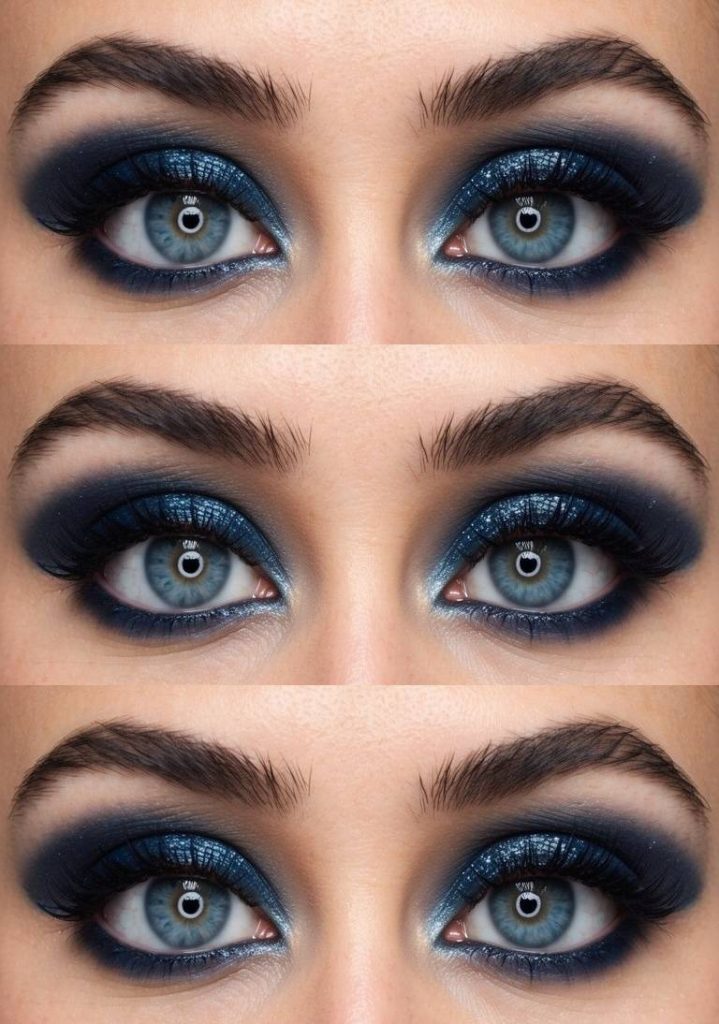 Creative eye makeup idea featuring metallic navy eyelids, blended outer corners, and icy shimmer in the inner corners for a space-inspired smokey look.