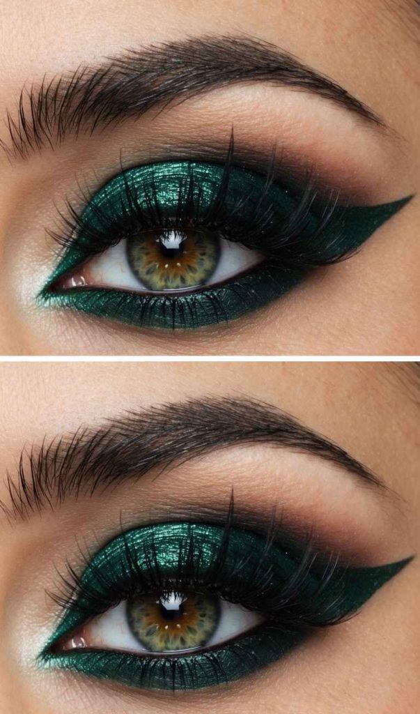 Detailed view of an emerald foil eyelid with soft brown blending and a crisp, elongated green wing.
