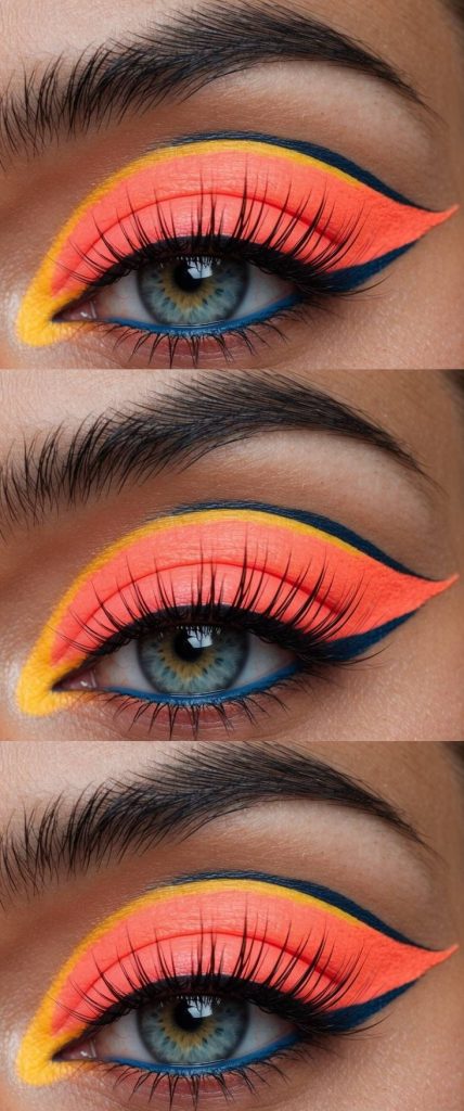 Artistic neon eye makeup idea featuring coral eyeshadow, lemon yellow accents in the corner, and a painterly navy eyeliner wing.