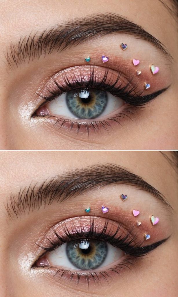 Valentine's Day eye makeup ideas showcasing blush shimmer eyeshadow, natural lashes, and iridescent heart accents arranged near the crease.