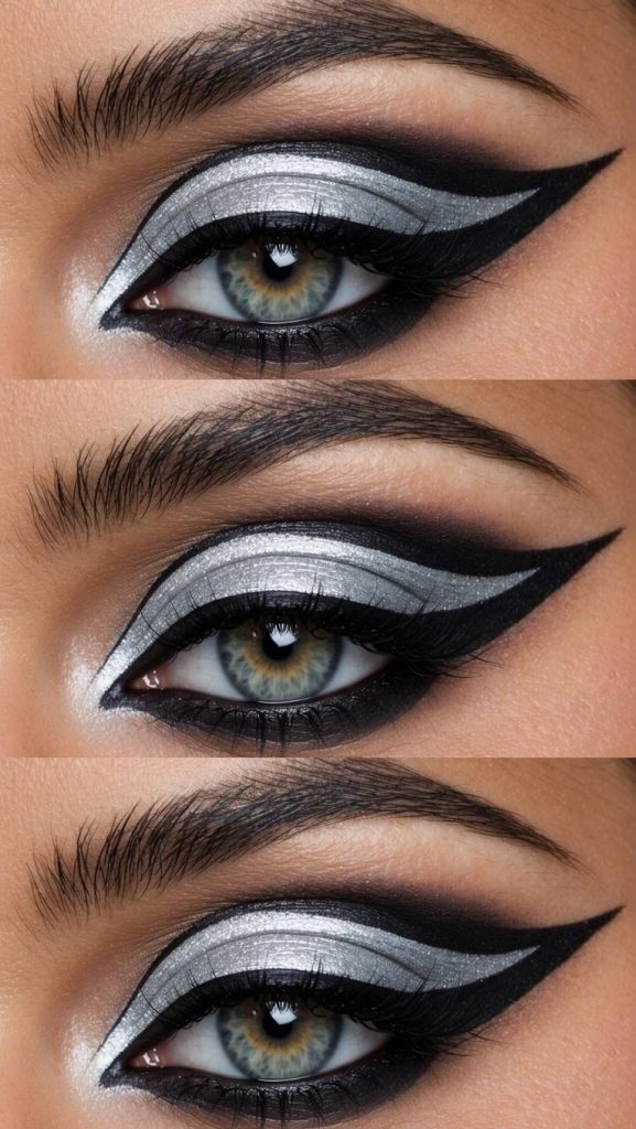 Cat eye makeup ideas shown with metallic silver eyeshadow on the lid, deep black smoky outer corner, graphic winged eyeliner, and dense lash definition in a close-up eye image.
