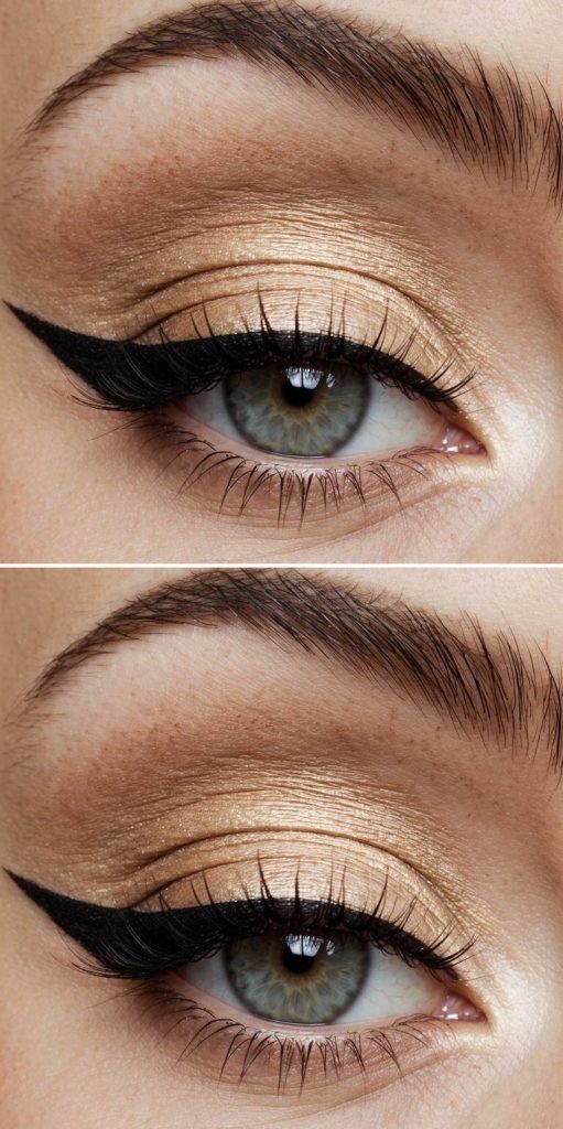 Close-up of an arabic eye makeup idea using pale gold shimmer on the lids and a bold, classic eyeliner wing for a minimalist glam look.