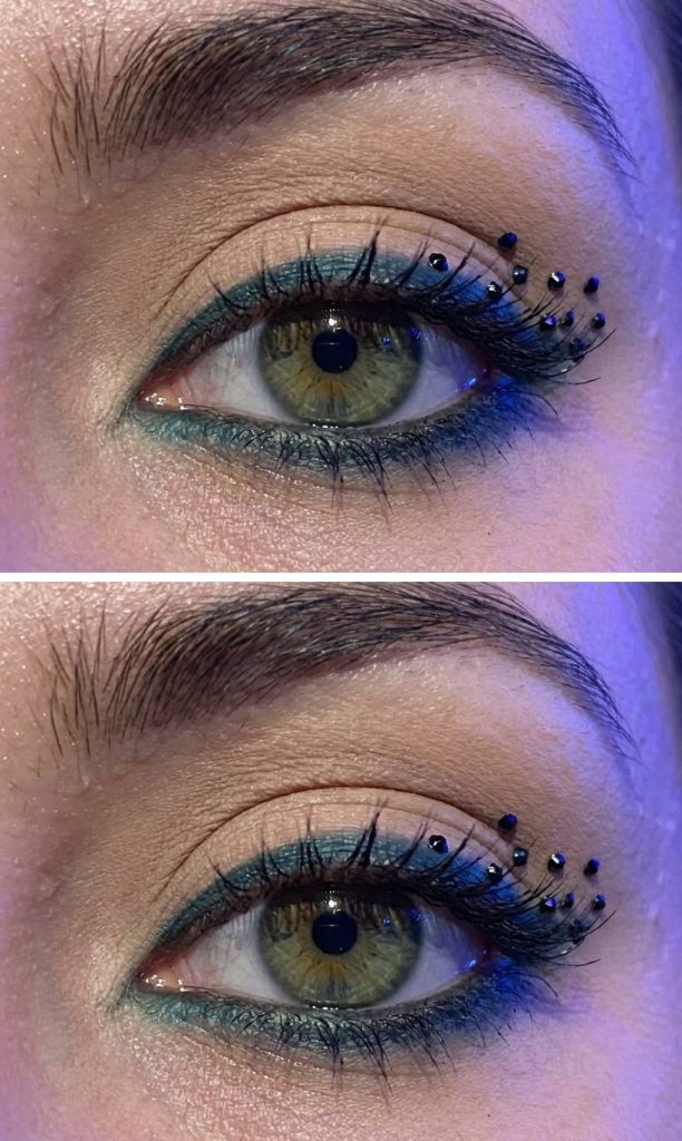 Eye makeup with aqua liner and dotted black rhinestones forming a playful, lash-like accent in this rhinestone eye makeup idea.