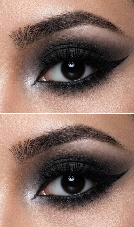 A close-up of a trad goth eye makeup look blending black and gray eyeshadow in a soft gradient with a defined eyeliner wing.