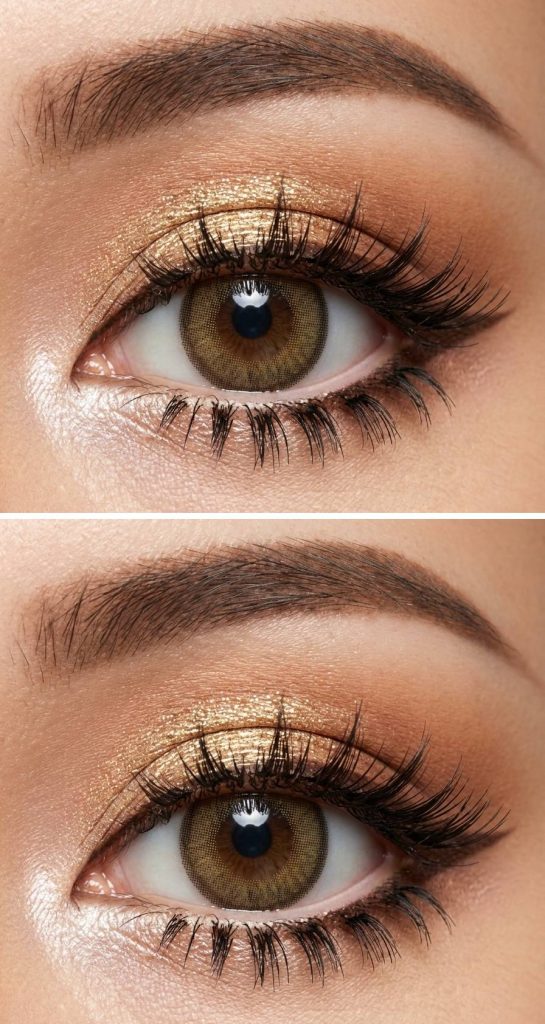 Close-up of gyaru eye makeup with golden metallic shimmer on the lids, bronzed shadow in the outer corner, and lifted lashes that frame the look.