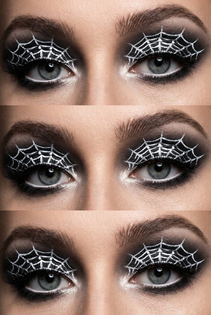 A spiderweb eye makeup idea with dark black lids and a striking fluorescent green web design drawn sharply from the outer eye area.