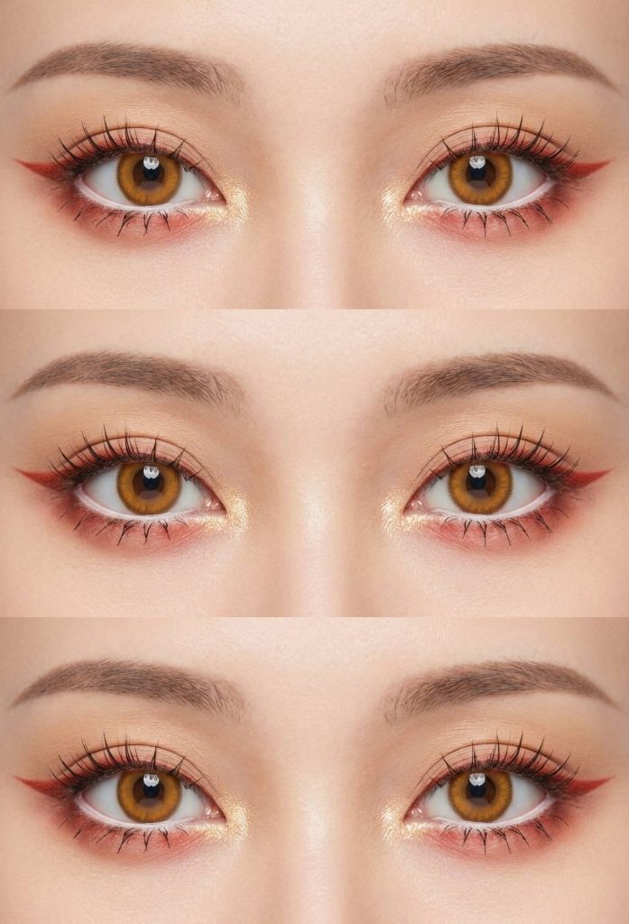 Anime eye makeup look with dramatic red eyeshadow wings, gold shimmer at the inner corners, and spiked lashes that enhance large anime-style brown eyes.