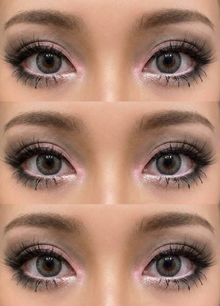 Gyaru eye makeup look featuring light pink shimmer on the lids, soft gray lenses, smoky lower lash shadow, and long upper lashes for an open-eye illusion.