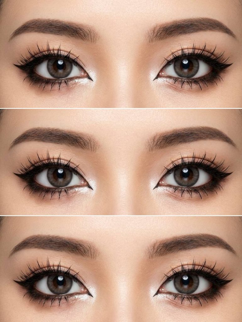 Gyaru eye makeup look featuring strong black eyeliner, pearly shimmer in the tear ducts, and voluminous lashes that lift and define the eyes.