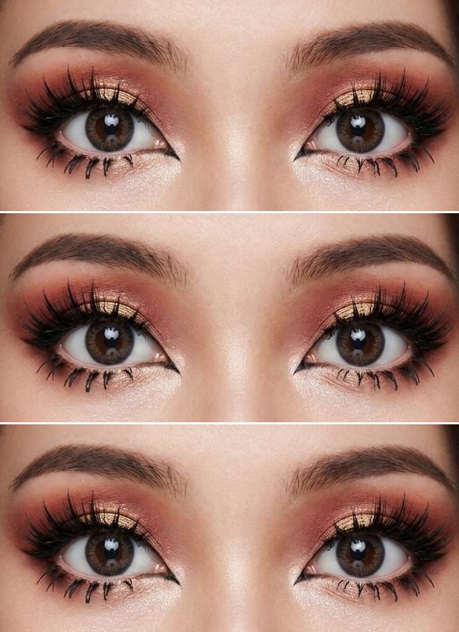 Gyaru eye makeup look with rose-toned blending, gold shimmer center lids, dramatic lashes, and dark detailing on the lower lash line.