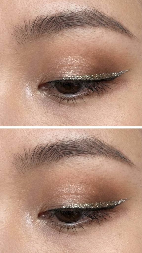 A monolid eye makeup look featuring soft bronze eyeshadow paired with a bold sweep of silver glitter eyeliner.