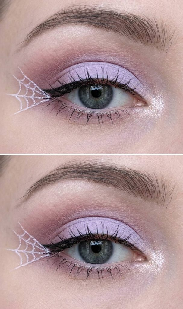 Close-up of a spiderweb eye makeup idea with lilac and mauve blended shadow, finished with a clean white web flick extending from the outer lash line.