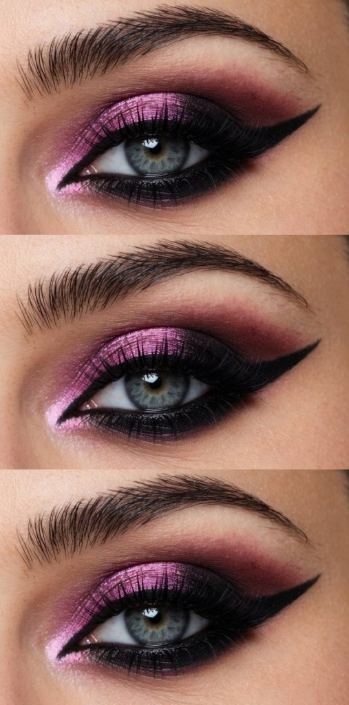 Trad goth eye makeup look blending pink shimmer and deep burgundy shadow, paired with bold black winged eyeliner for a soft-meets-sharp aesthetic.
